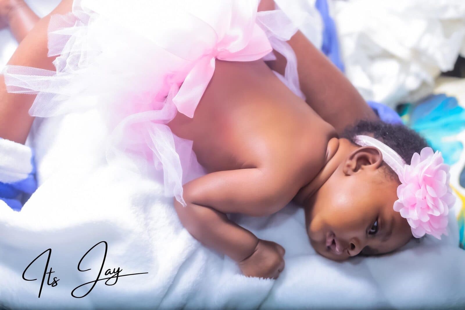 Newborn Pink Dress Portrait - Jay Pixels portrait photography by a UK photographer and cameraman